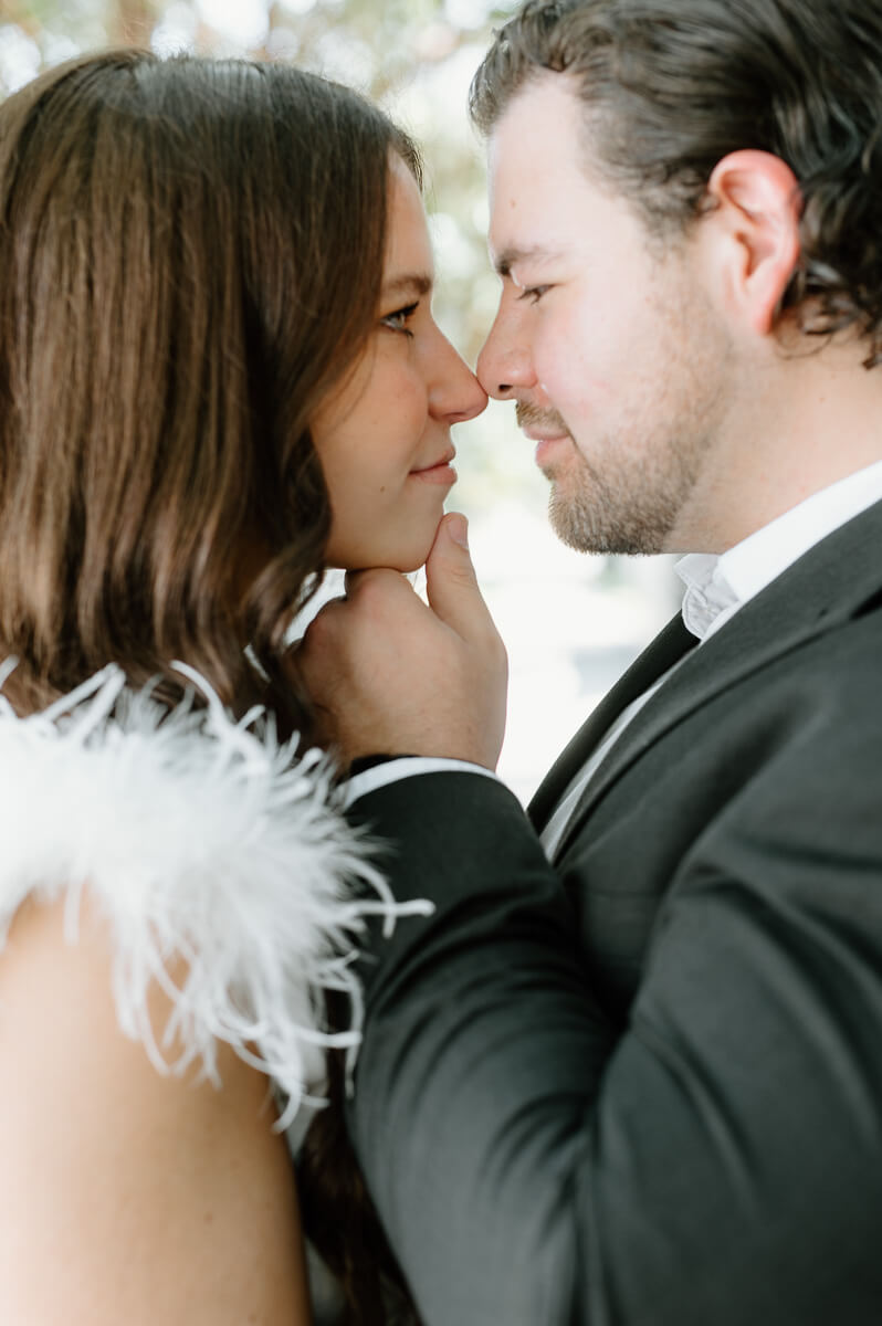 a couple standing outside of station 3 wedding venue