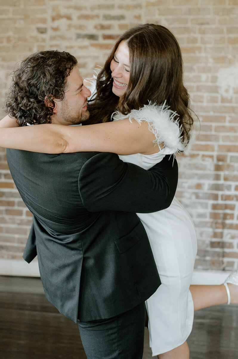 a couple spinning inside station 3 wedding venue