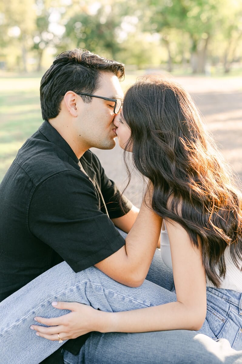 a couple walking and holding hands at their Houston engagement session