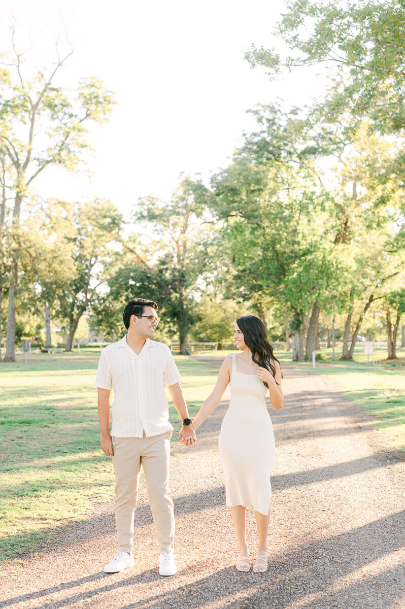 a couple cuddling during their Houston engagement session