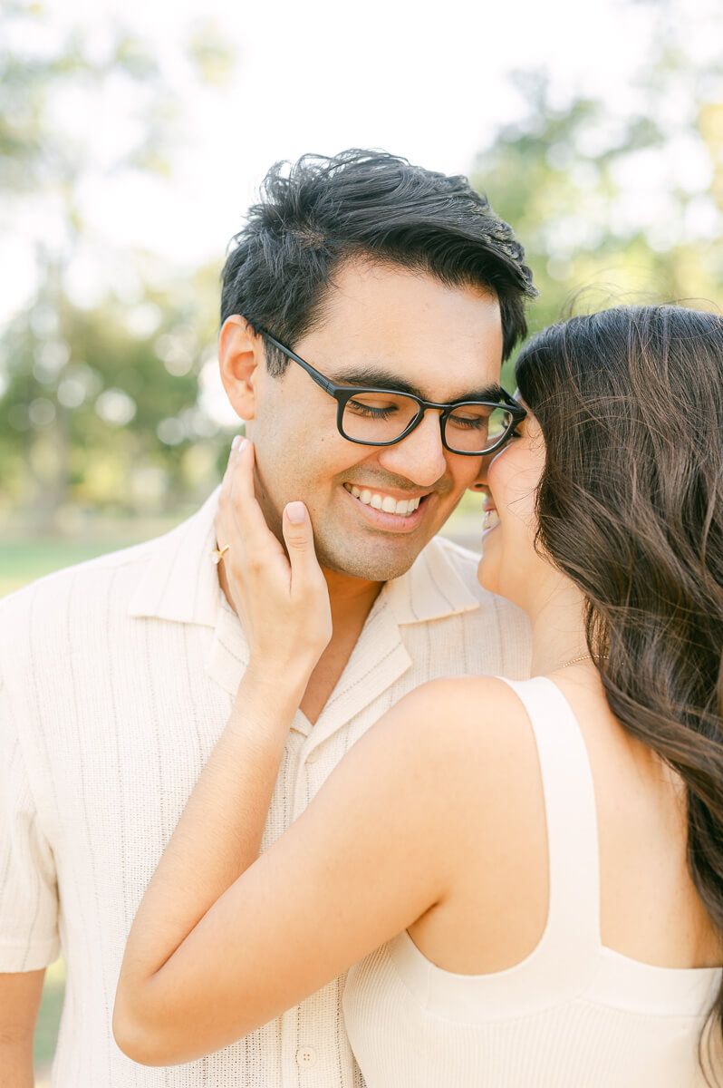 a couple cuddling by Houston wedding photographer Eric & Jenn Photography