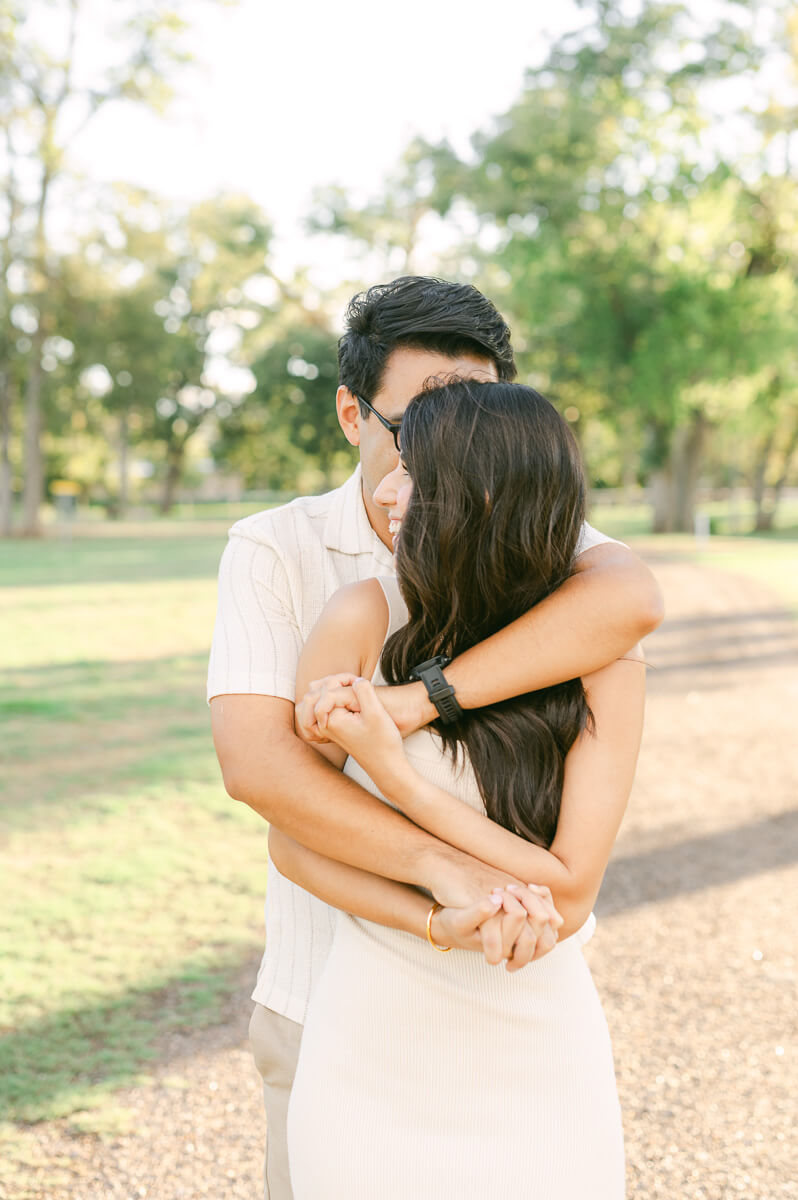 a couple at their engagement session by Houston wedding photographer Eric & Jenn Photography