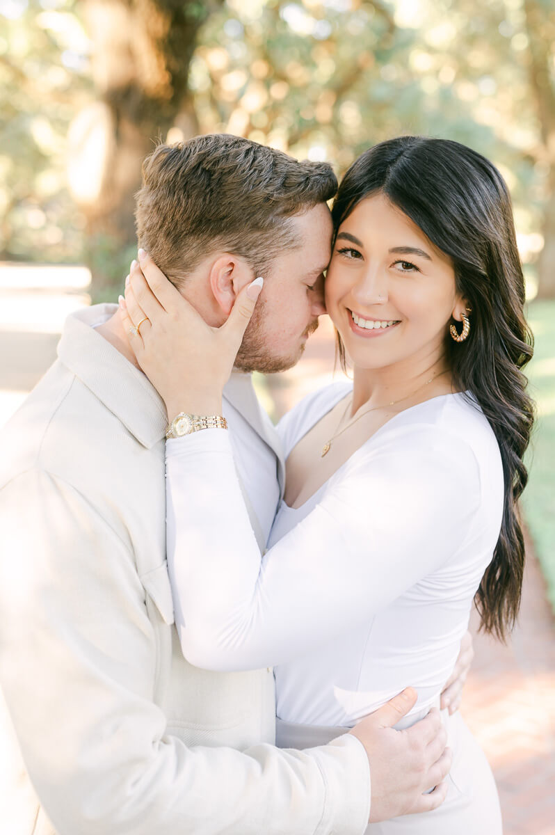 a couple under the trees on North Boulevard in Houston