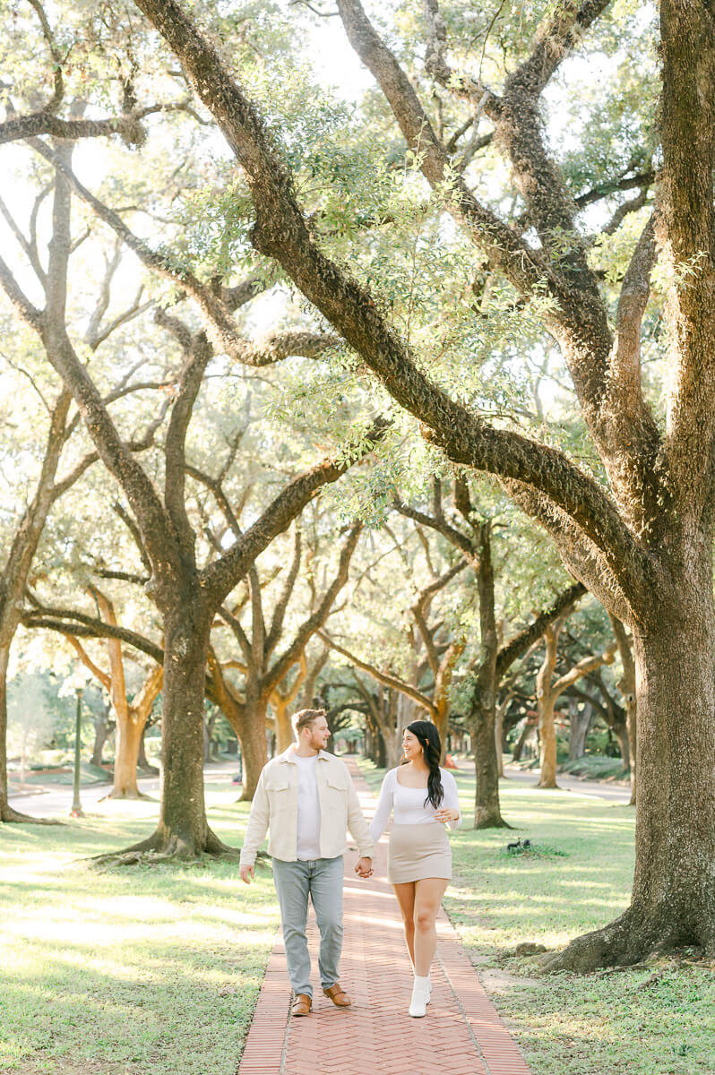 a couple walking the houston street north boulevard  