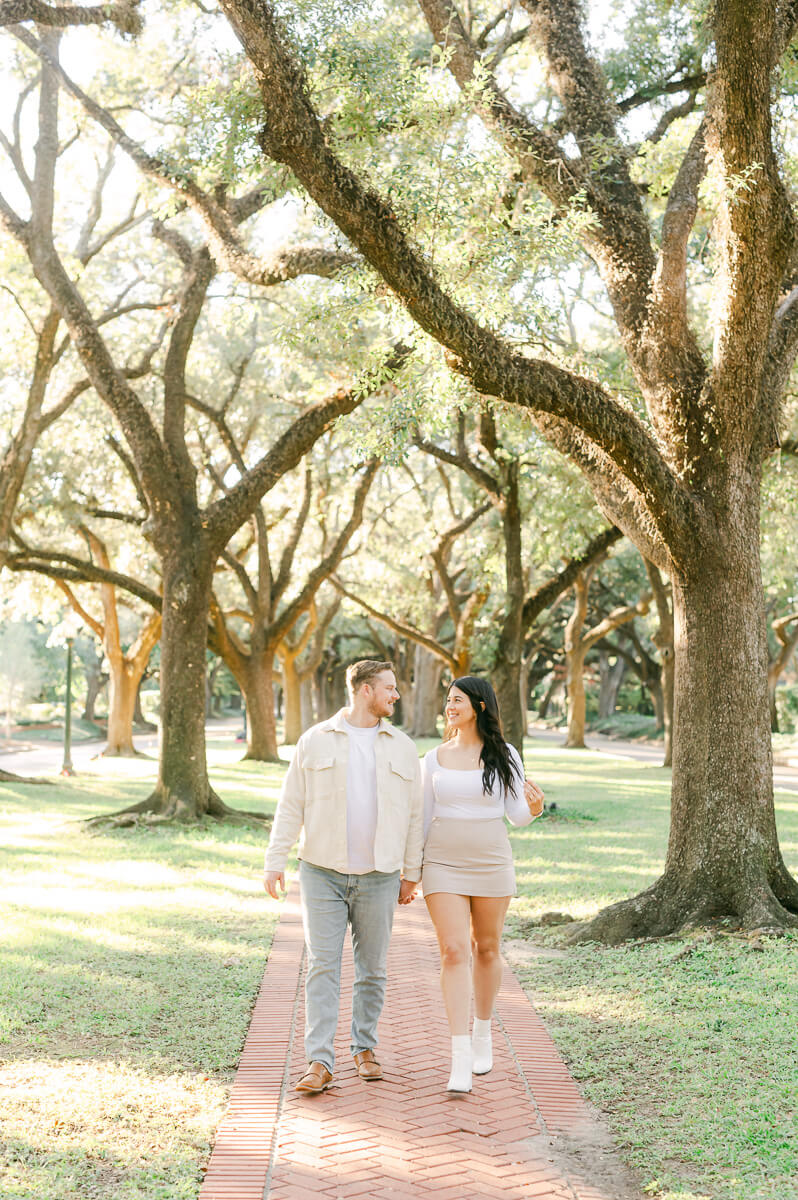 a couple walking the houston street north boulevard  