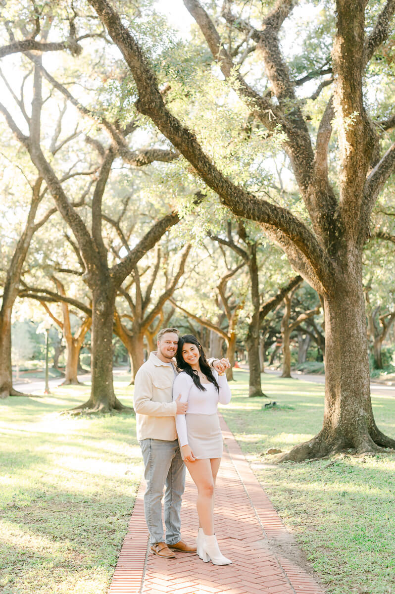 a couple posing on the pathway of north boulevard  