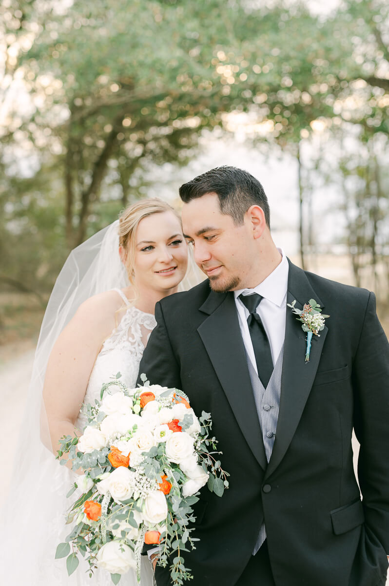 a couple at their wedding at beckendorff farms katy texas