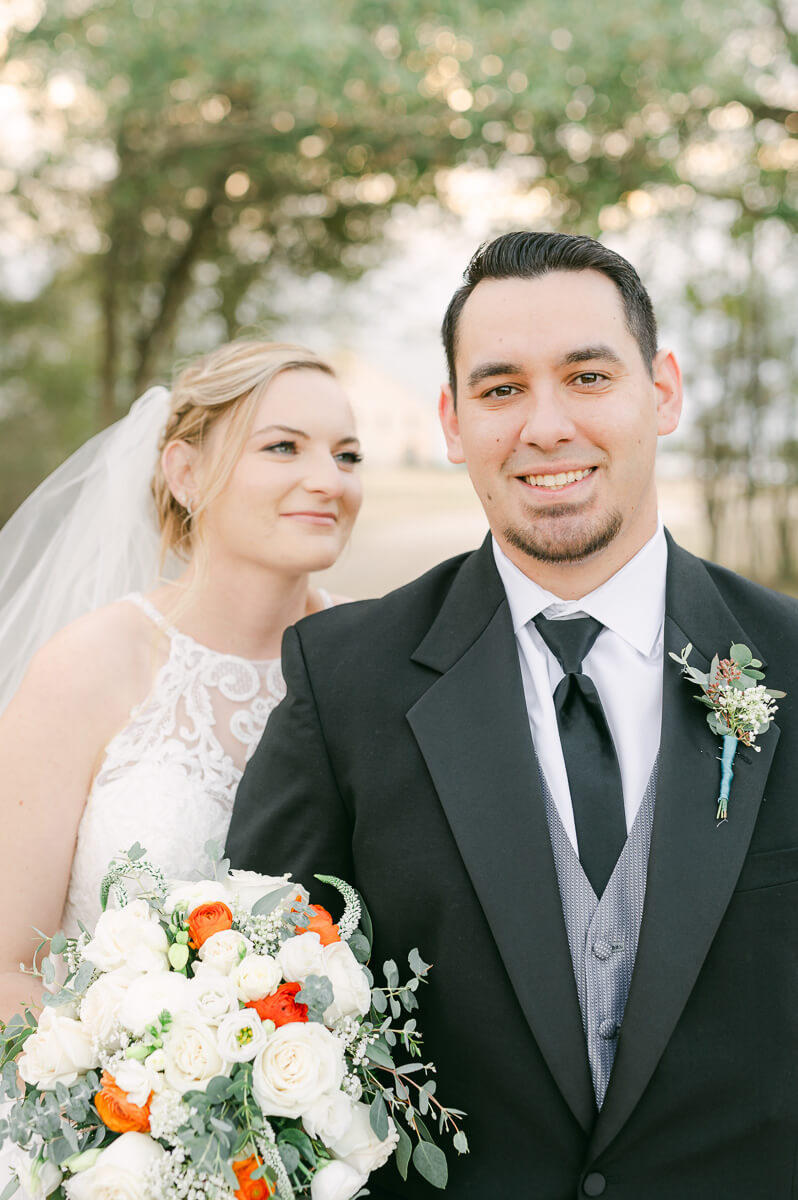 a couple at their wedding at beckendorff farms katy texas