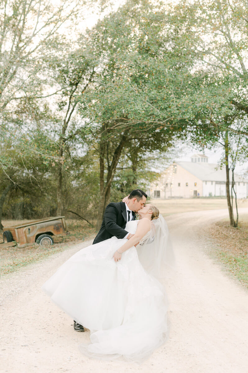 a couple at their wedding at beckendorff farms katy texas