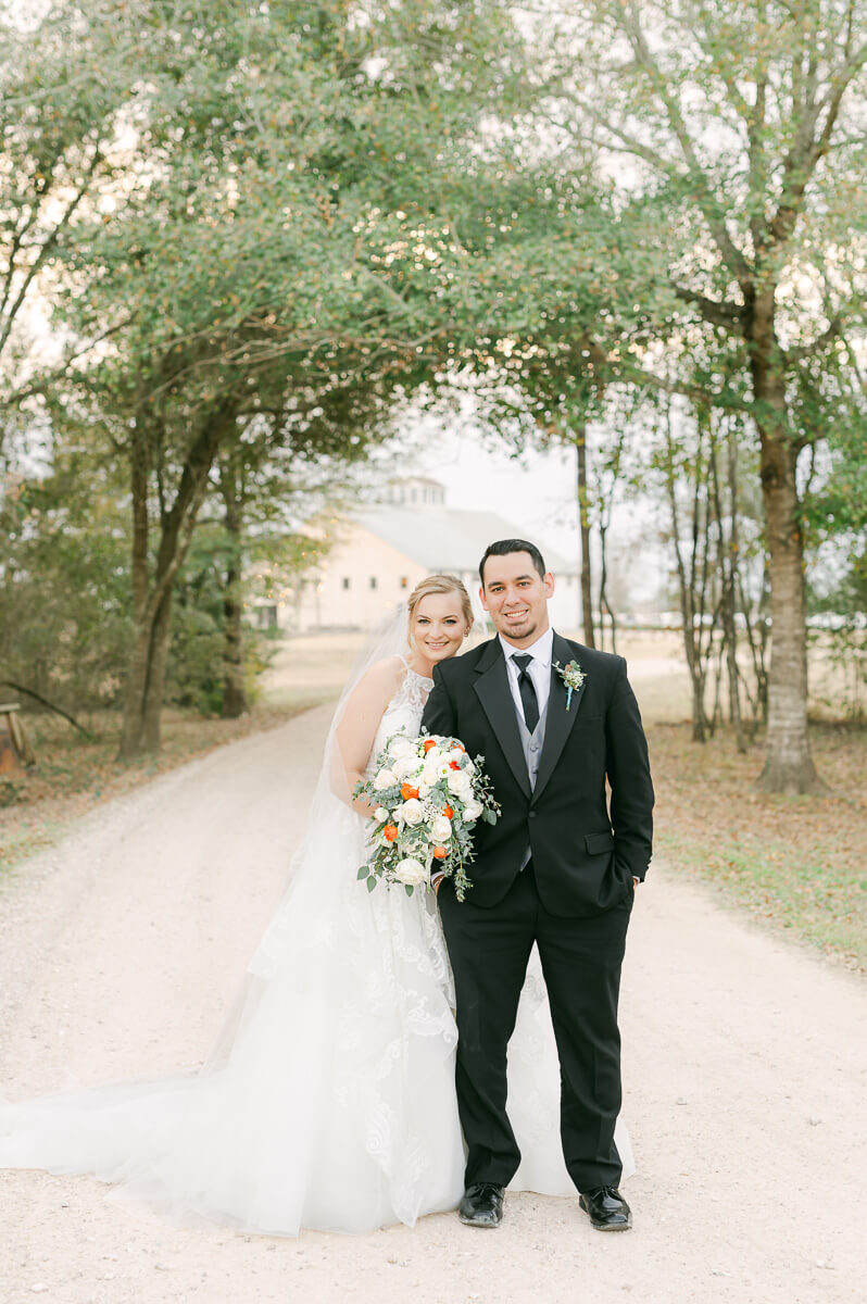 a couple at their wedding at beckendorff farms katy texas