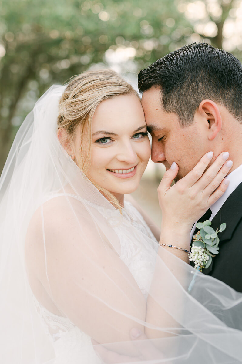 a couple at their wedding at beckendorff farms katy texas