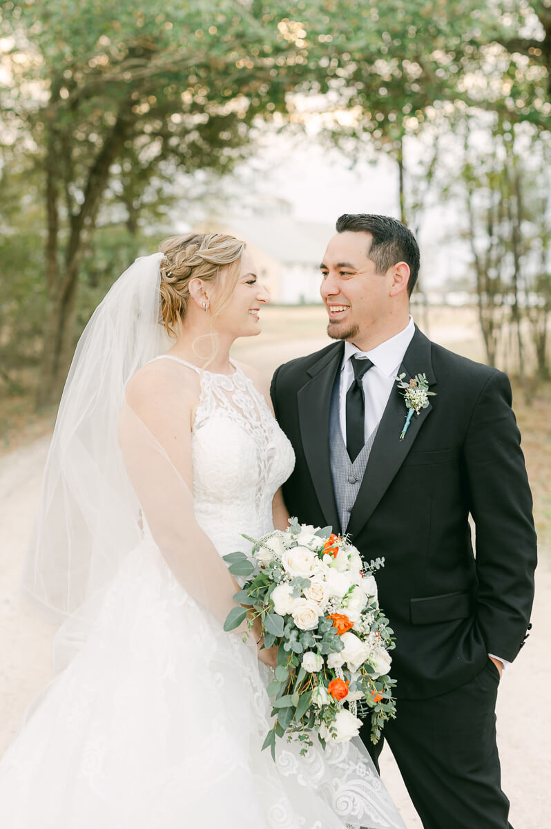 a couple at their wedding at beckendorff farms katy texas