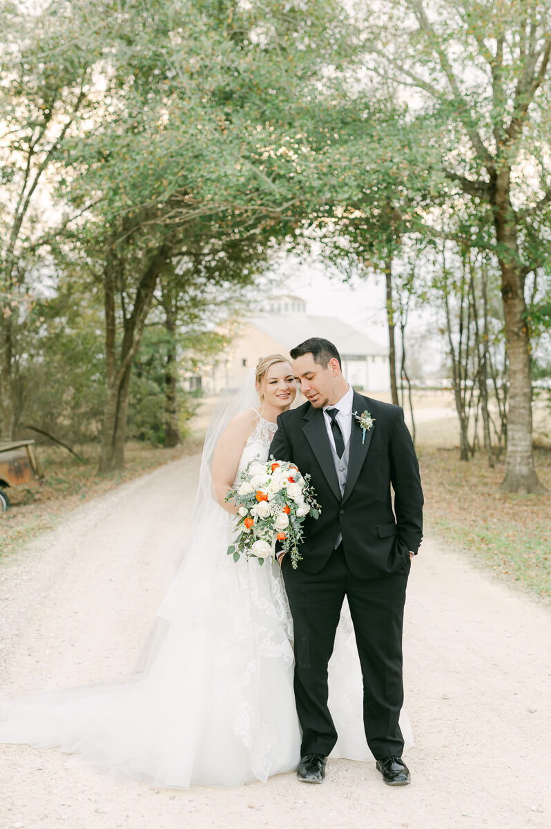 a couple at their wedding at beckendorff farms katy texas