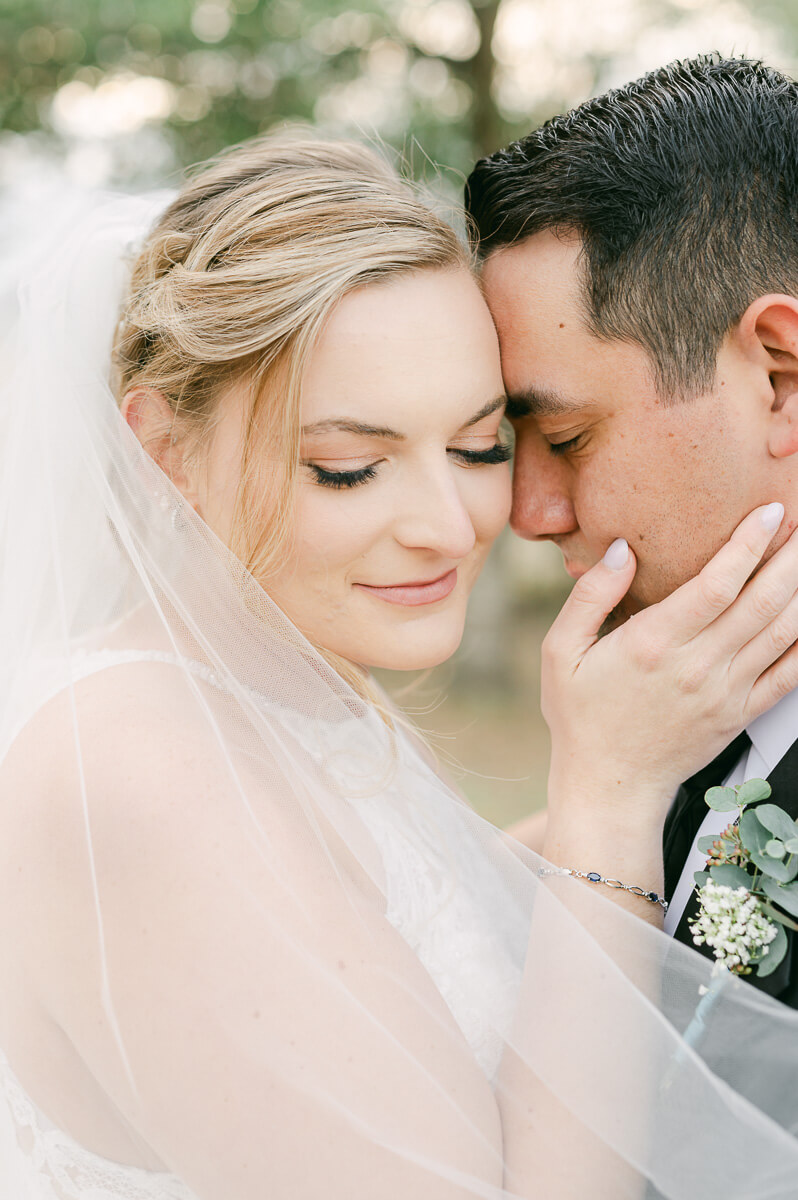 a couple at their wedding at beckendorff farms katy texas