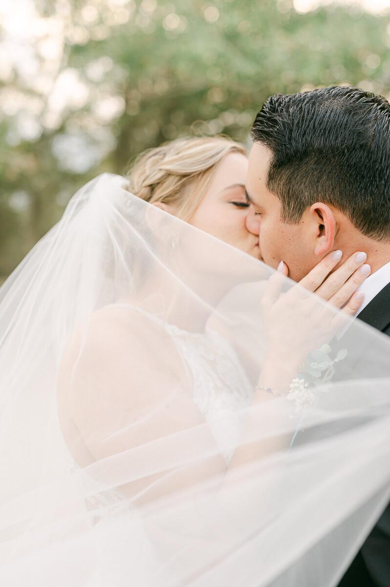 a couple at their wedding at beckendorff farms katy texas