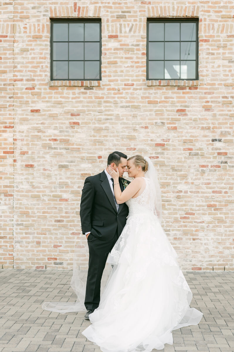 a couple at their wedding at beckendorff farms katy texas