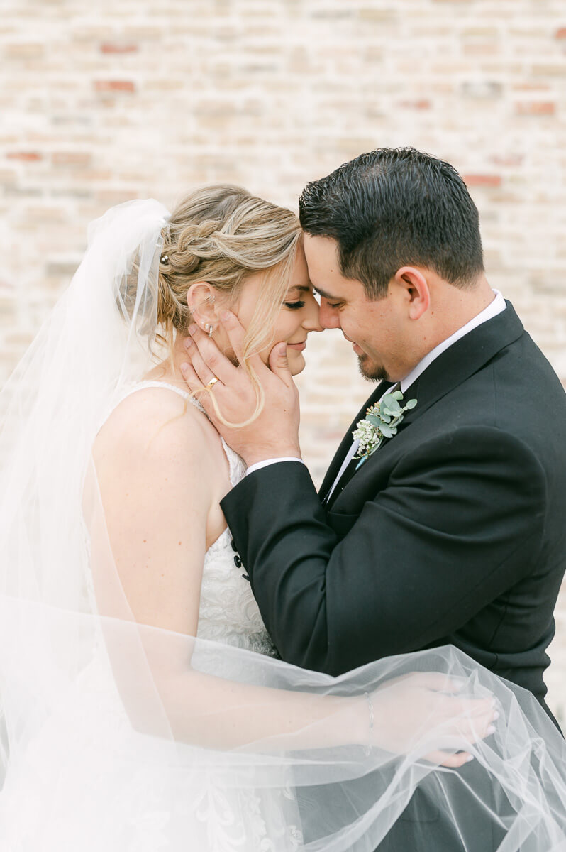 a couple at their wedding at beckendorff farms katy texas