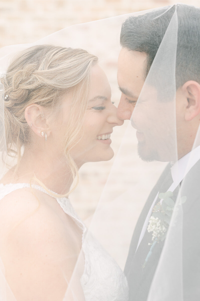 a couple at their wedding at beckendorff farms katy texas