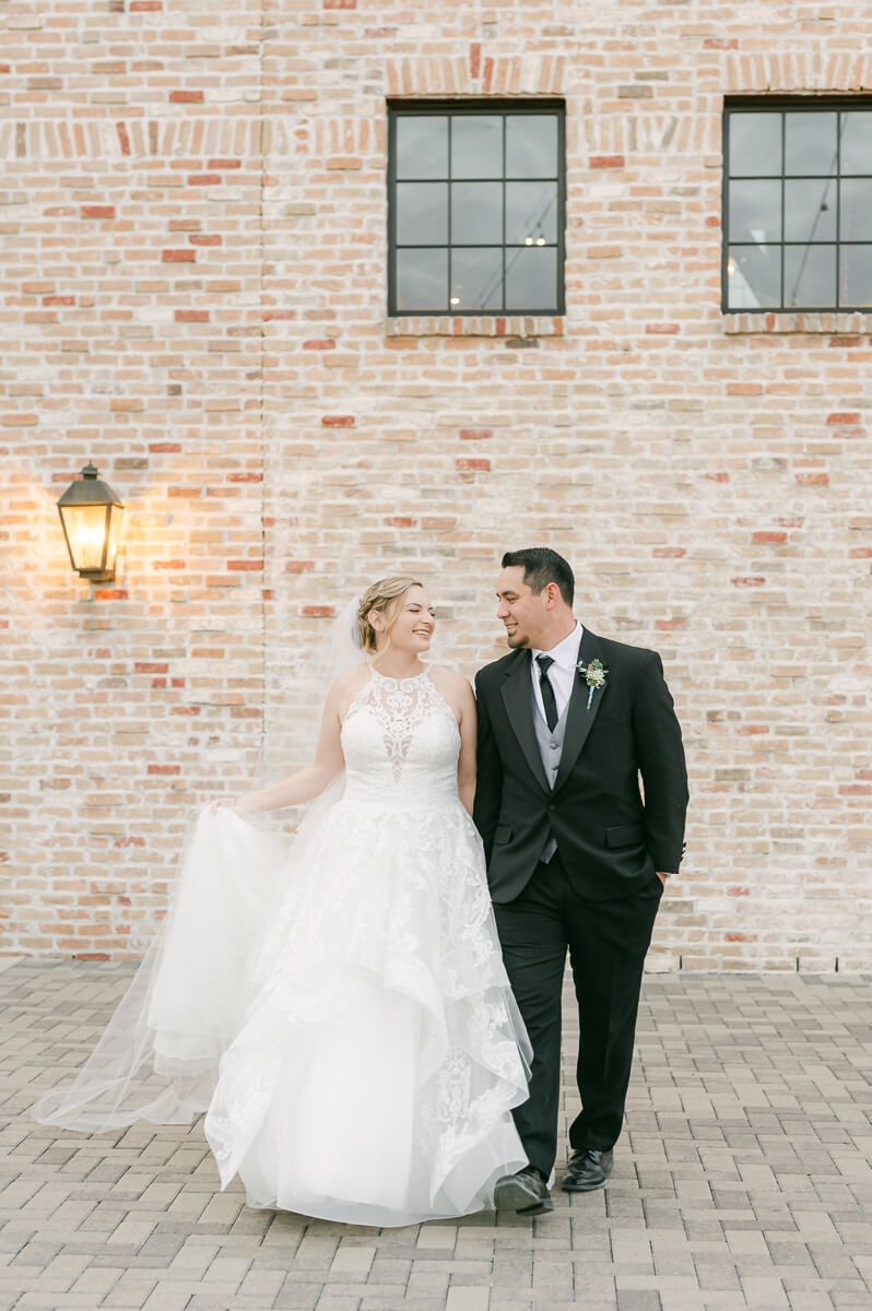 a couple at their wedding at beckendorff farms katy texas