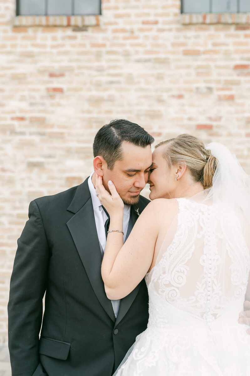 a couple at their wedding at beckendorff farms katy texas