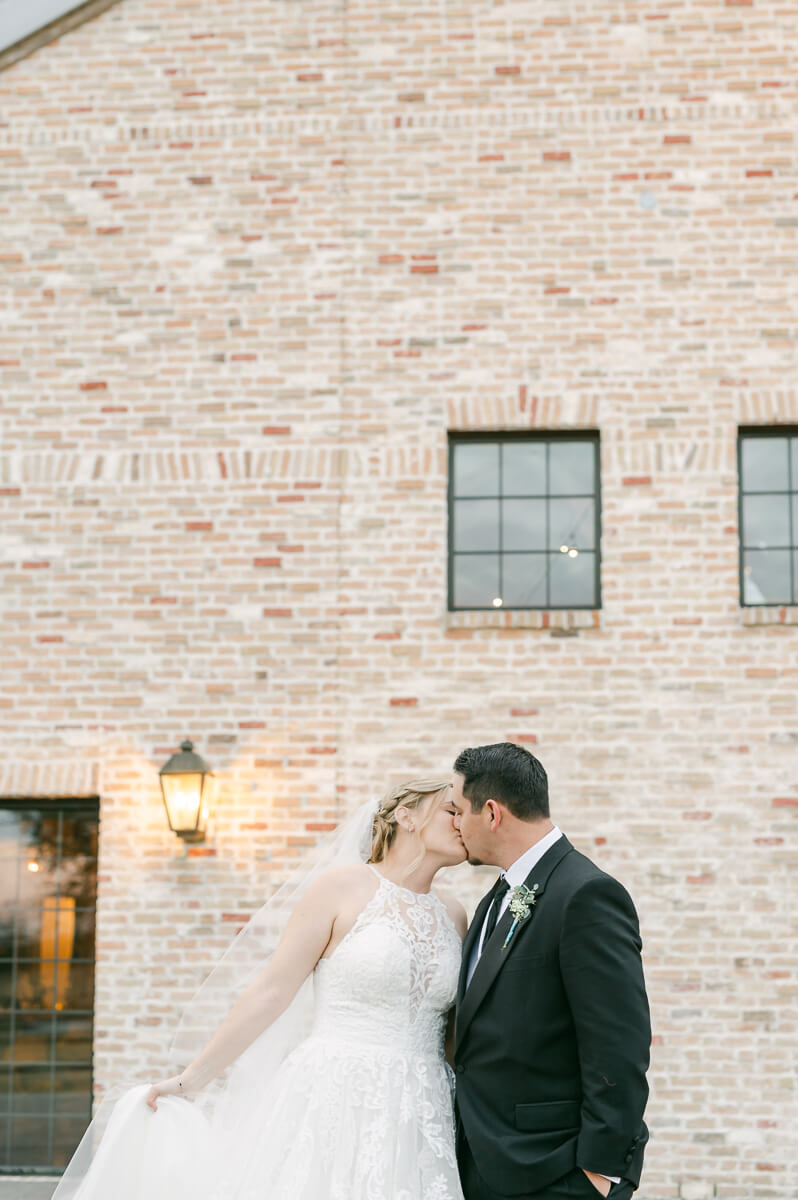 a couple at their wedding at beckendorff farms katy texas