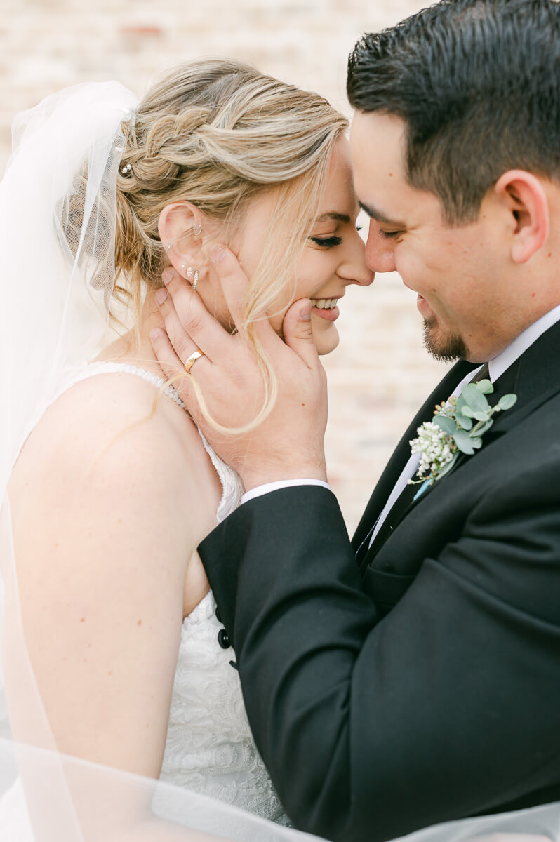 a couple at their wedding at beckendorff farms katy texas