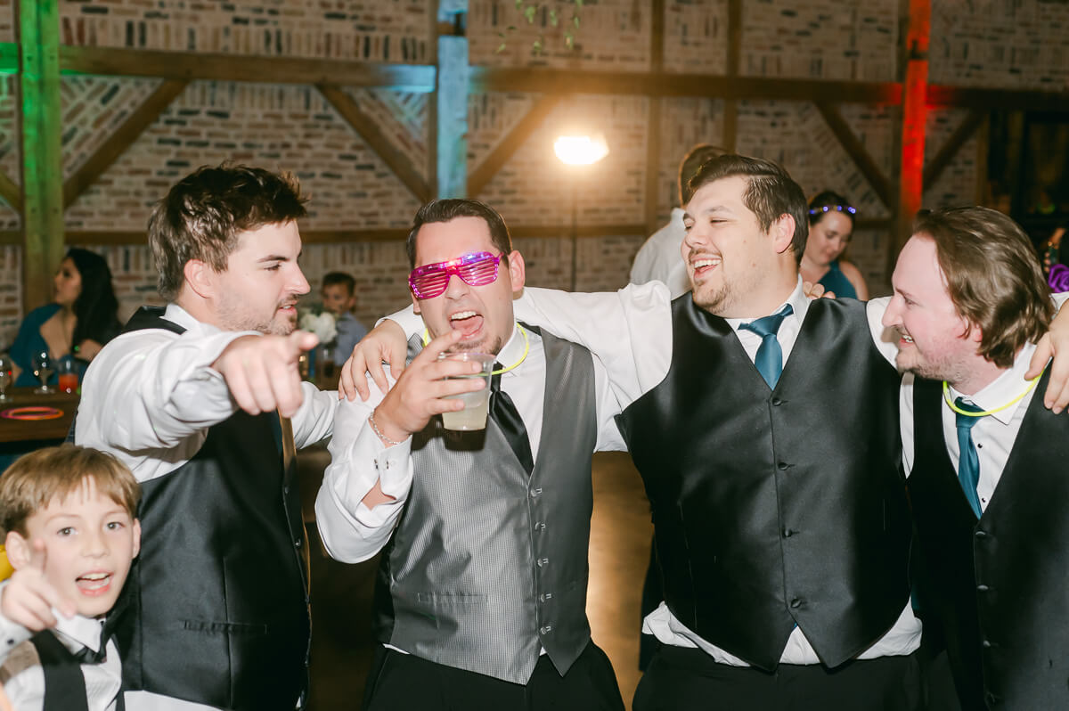 wedding reception at beckendorff farms katy texas by houston wedding photographer eric and jenn photography