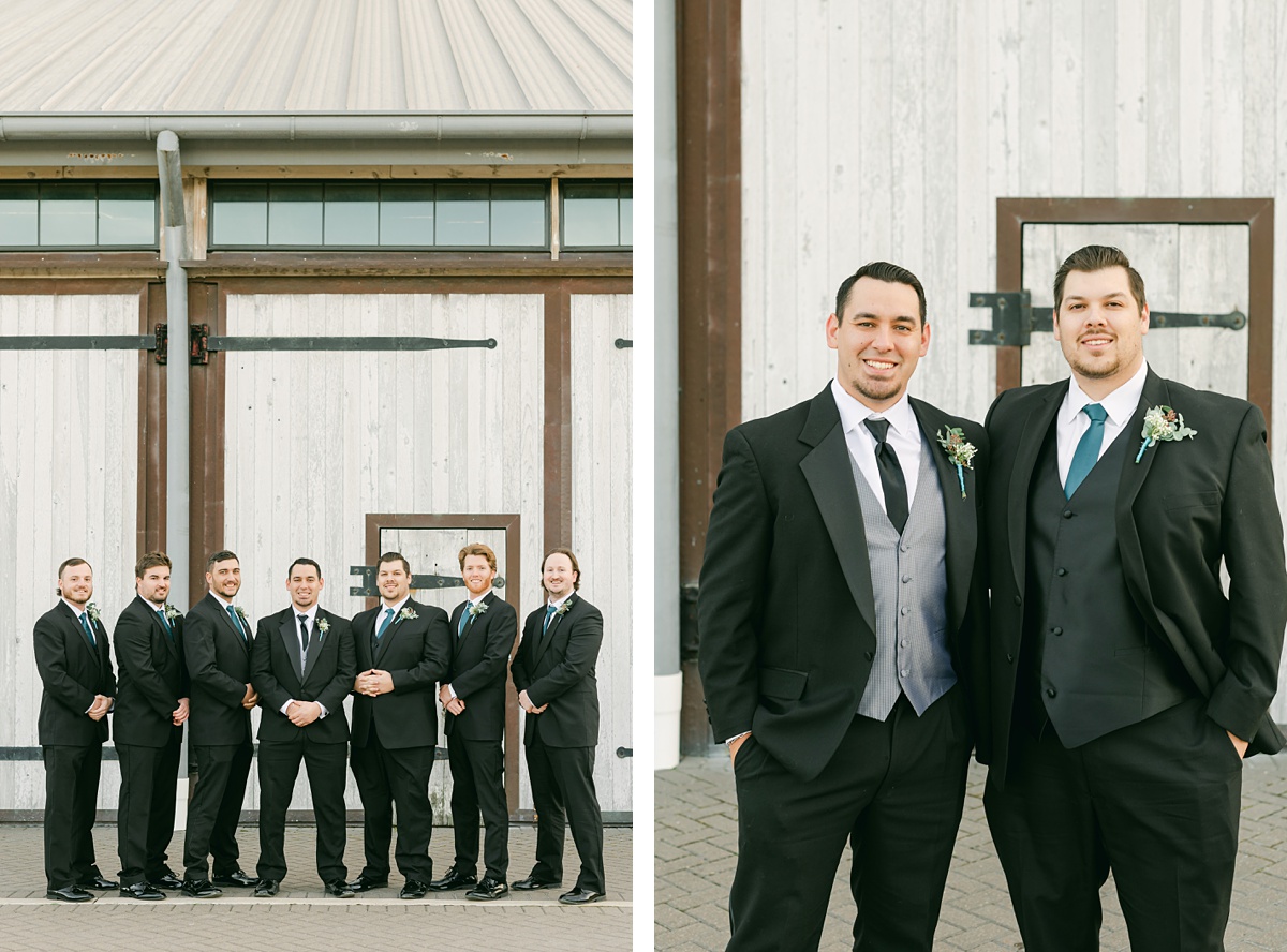 groomsmen in black suits at beckendorff farms 