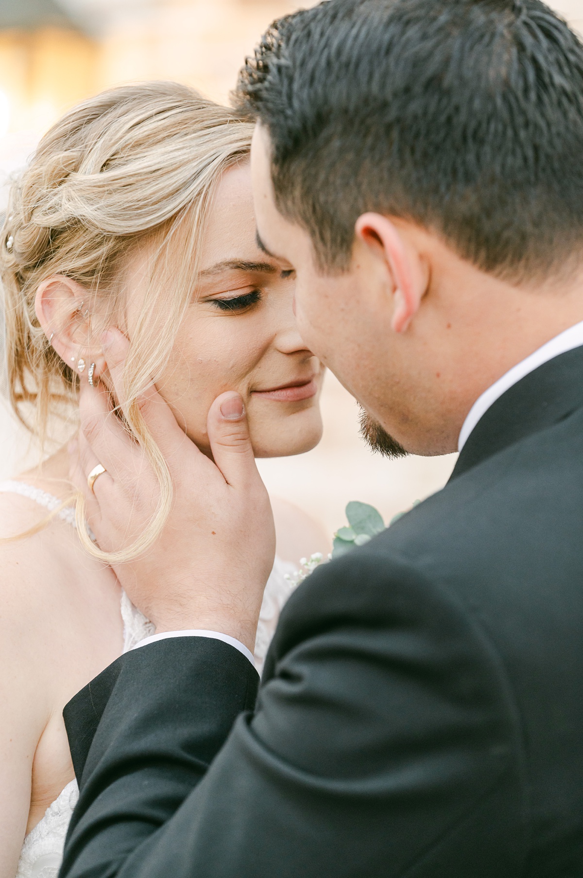 intimate moment between bride and groom