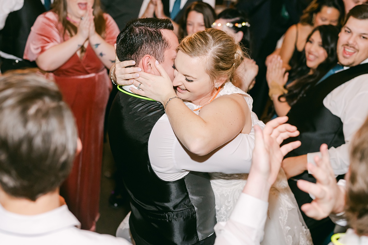 bride and groom hugging during their beckendorff farms reception