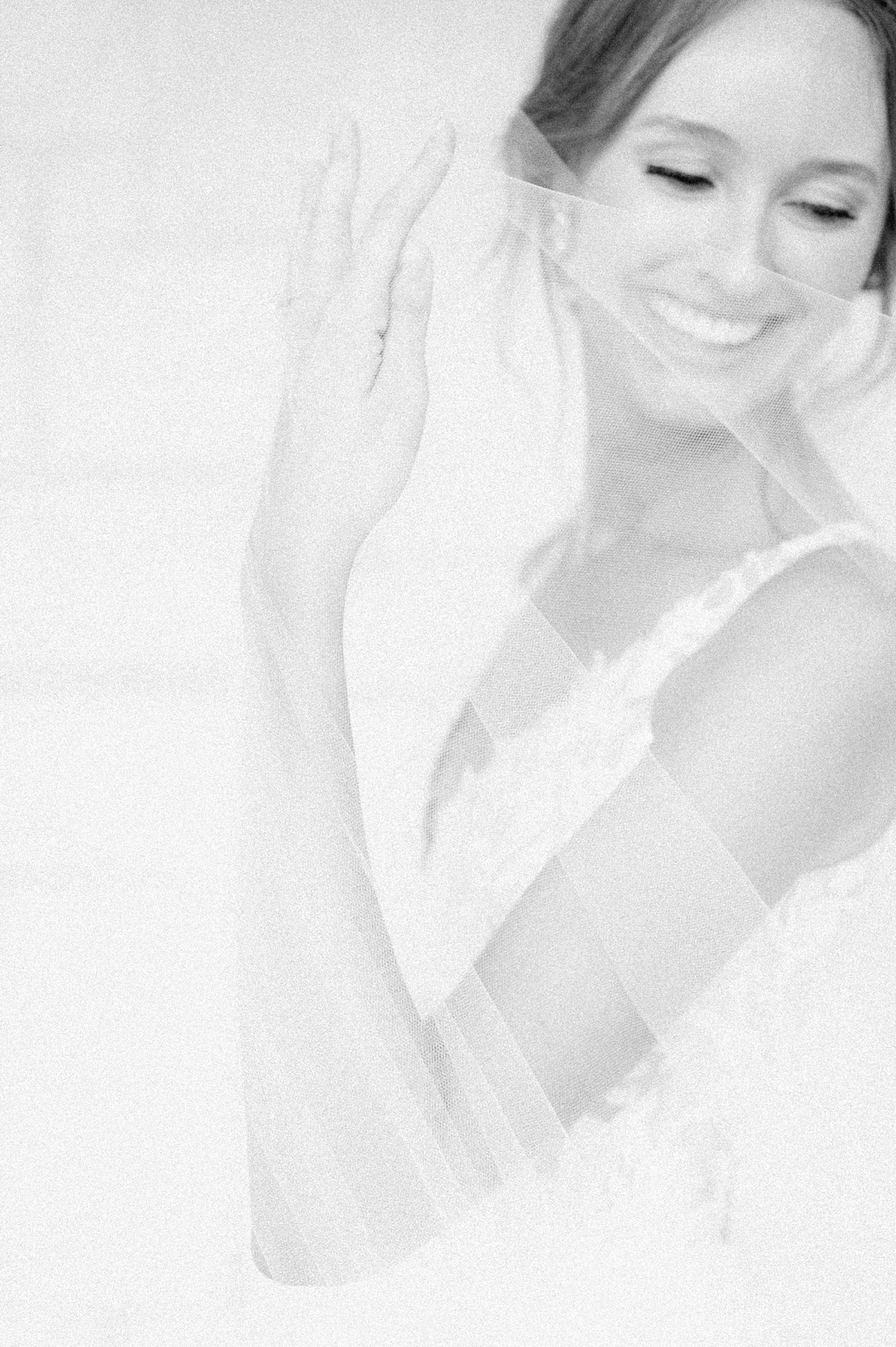 black and white image of a bride at briscoe manor