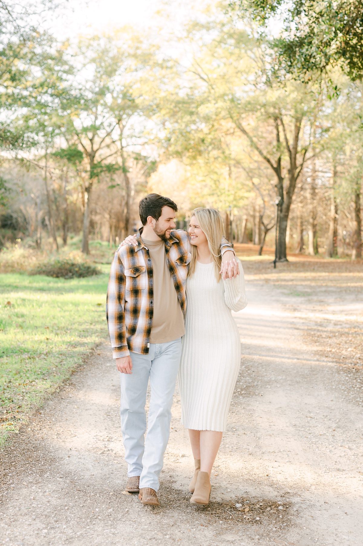 couple walking during their cypress engagement session 