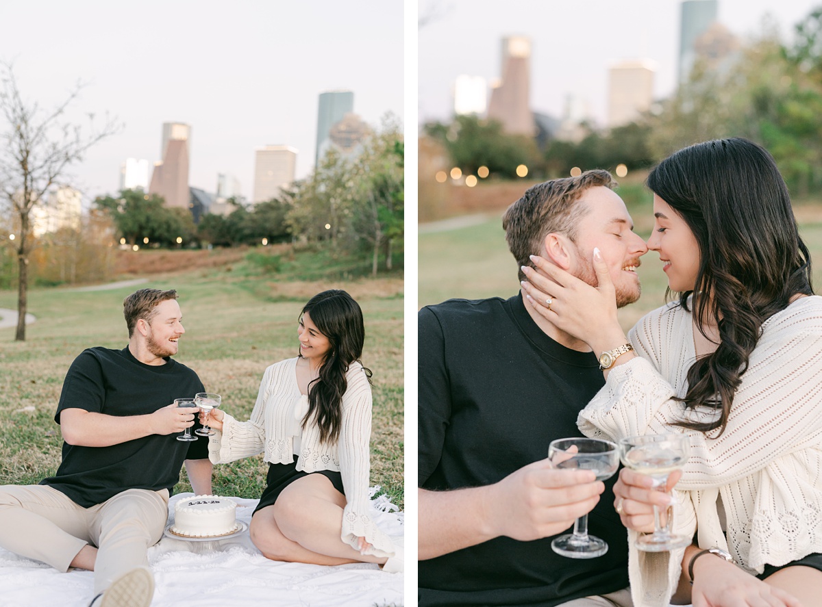 a couple with cake and champagne in front of the houston city skyline
