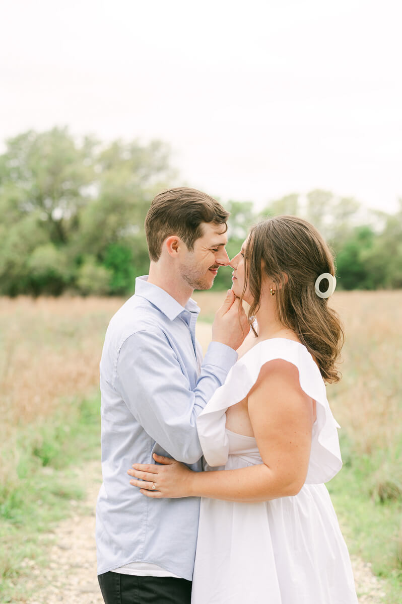 couple posing for engagement photos