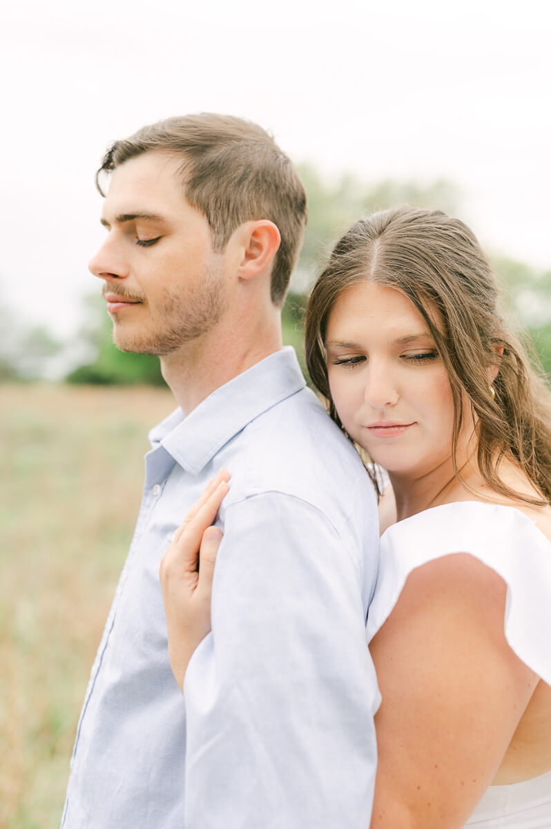 couple posing for engagement photos