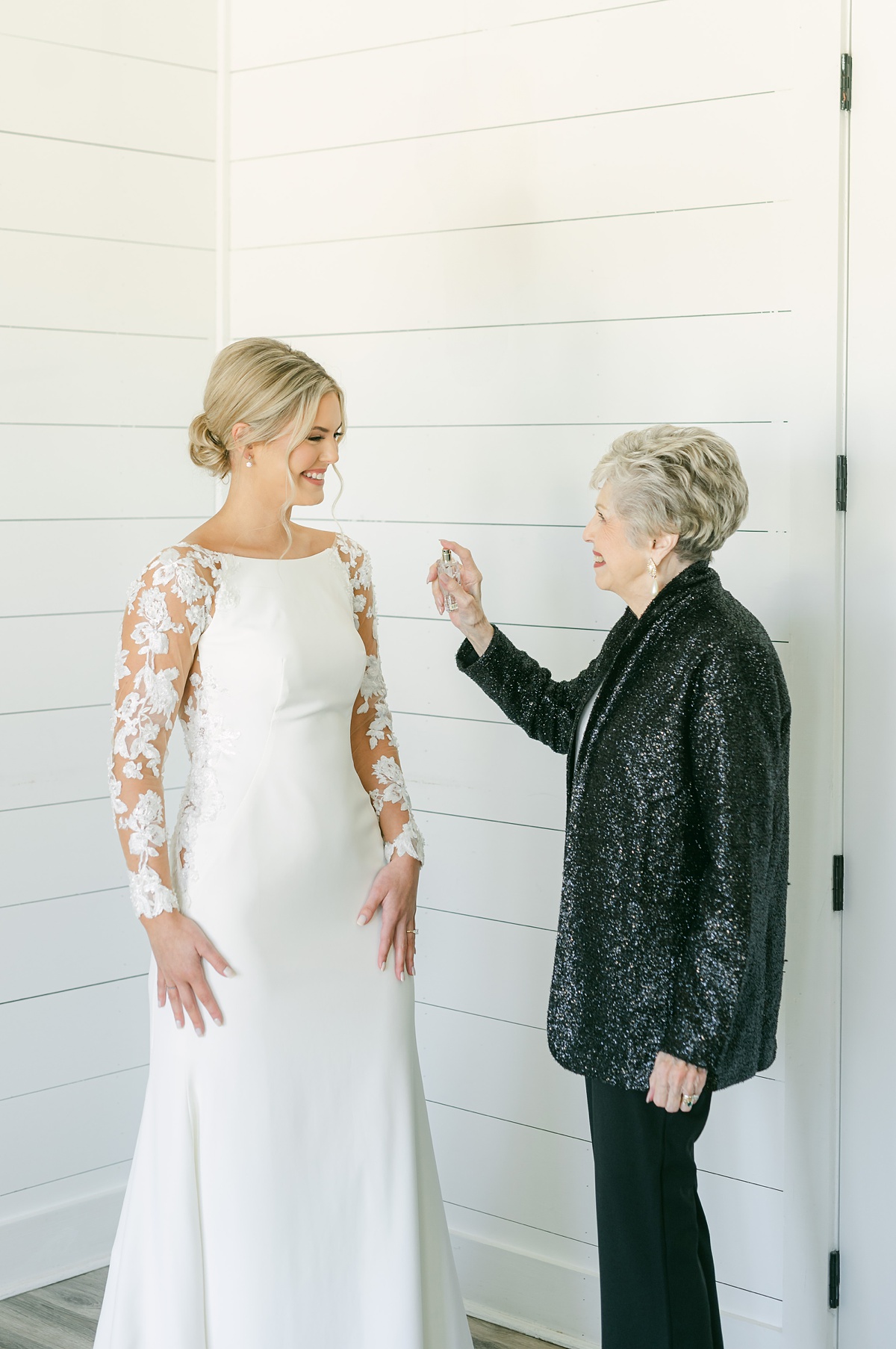 a bride and her grandma in the bridal suite of the farmhouse wedding venue
