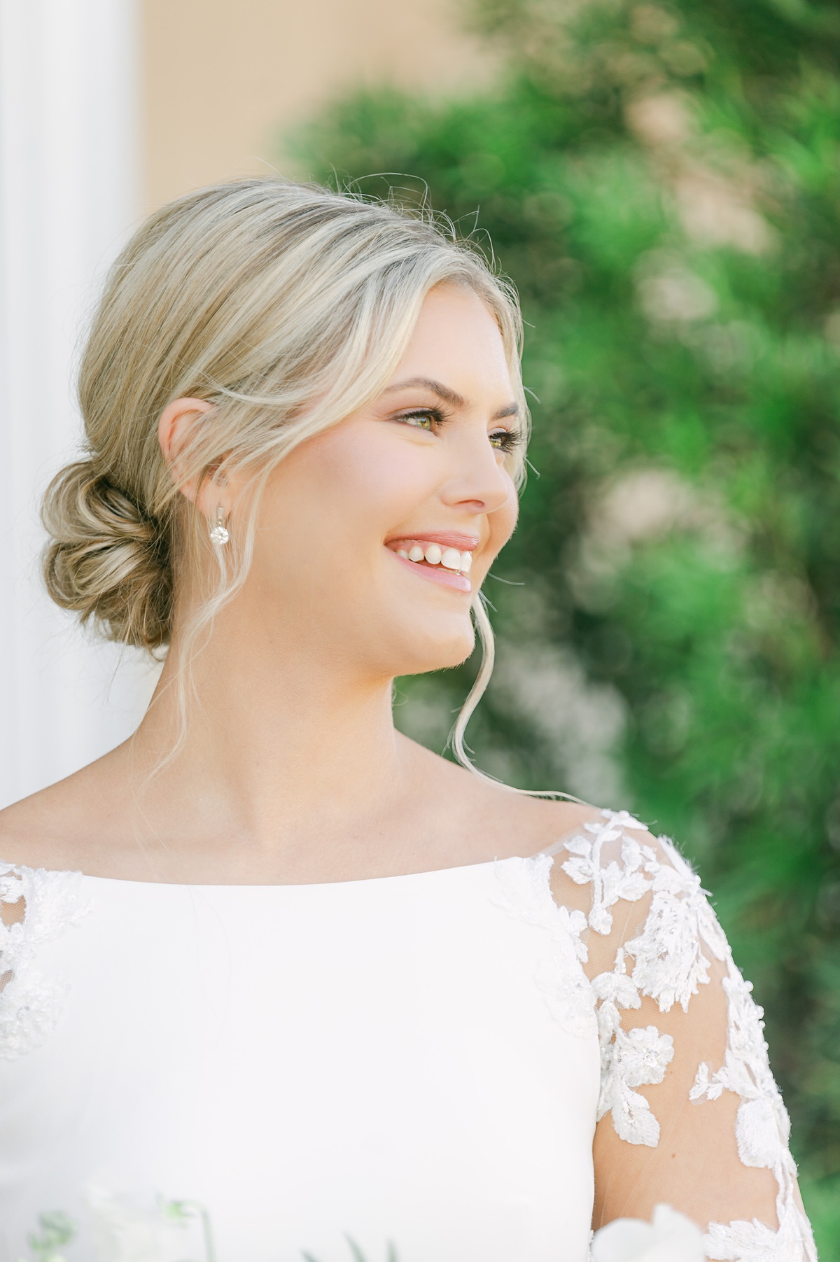 beautiful bride on her wedding day at the farmhouse