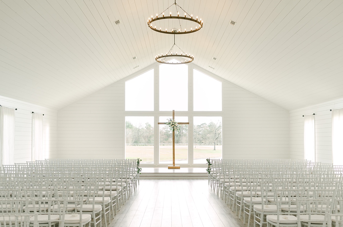 the farmhouse wedding chapel with white florals