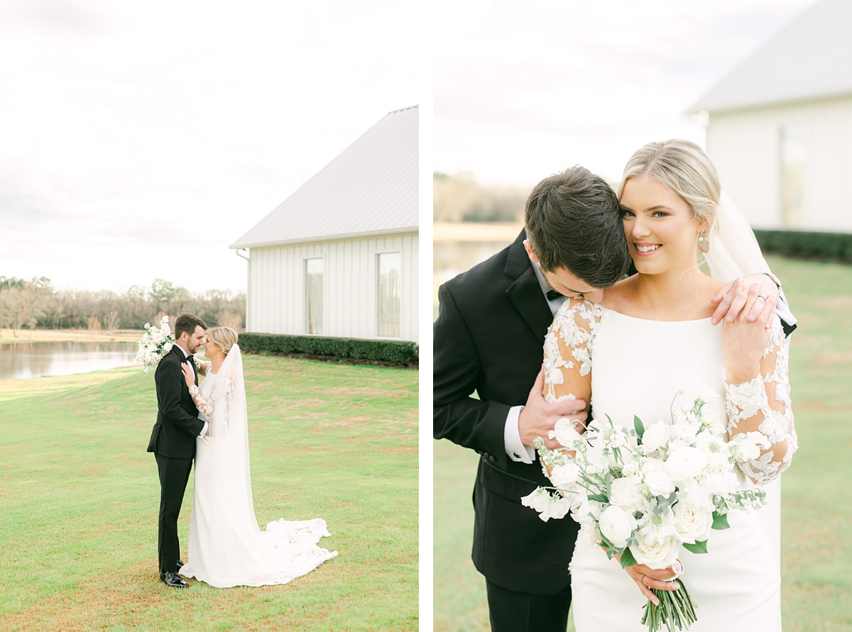 bride and groom cuddling in front of the lake at the farmhouse