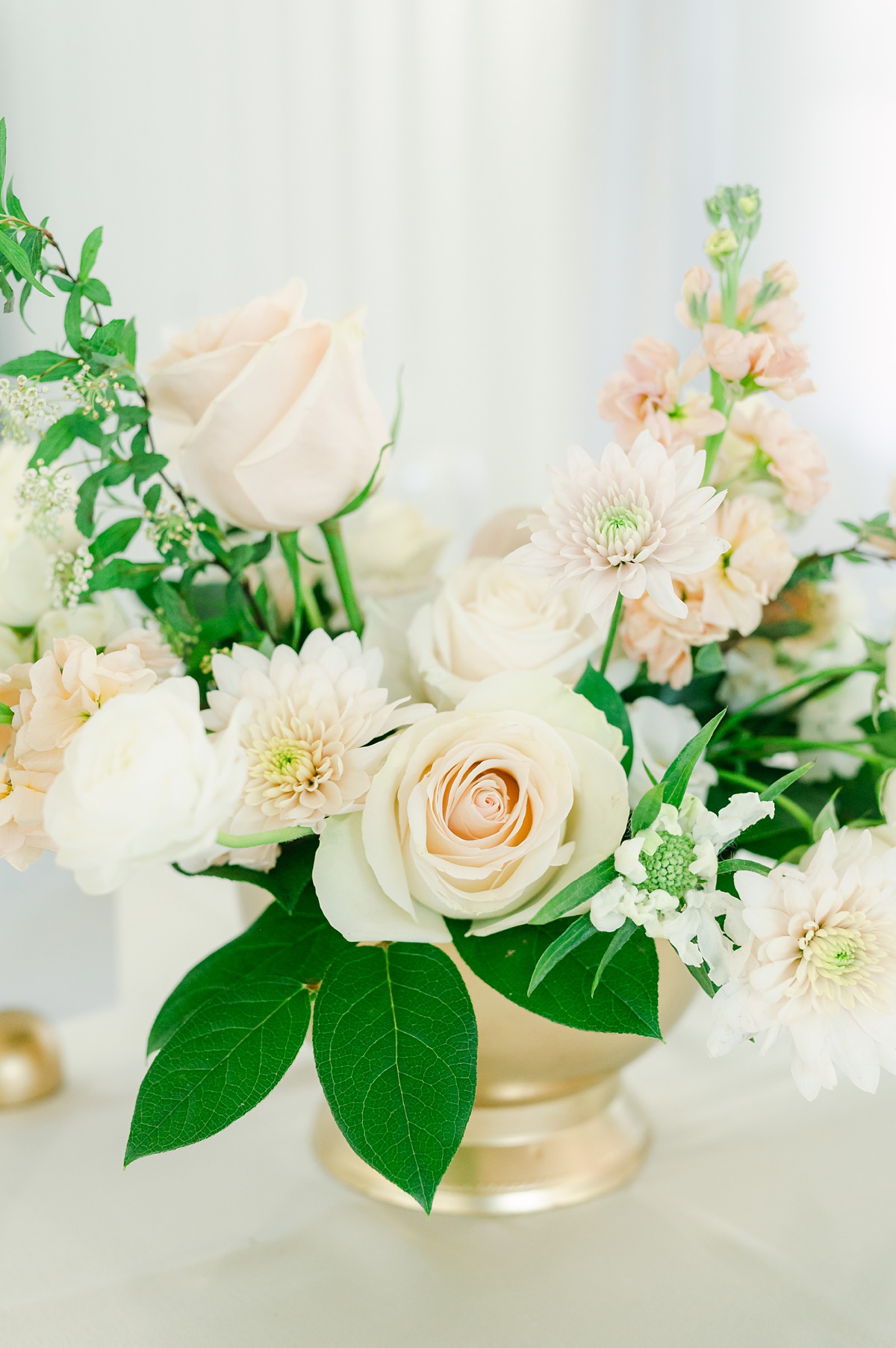 soft pink and white florals with pops of greenery 