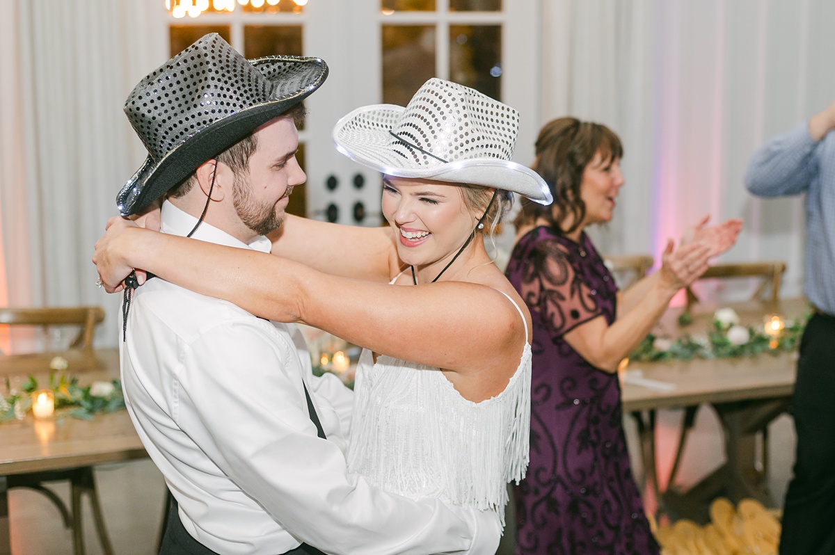 a couple dancing at their farmhouse wedding reception 