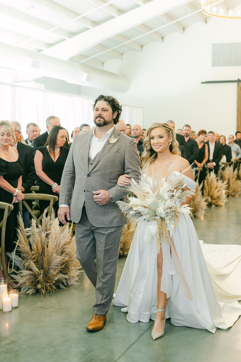 bride walking up the aisle at Magnolia Grove wedding venue