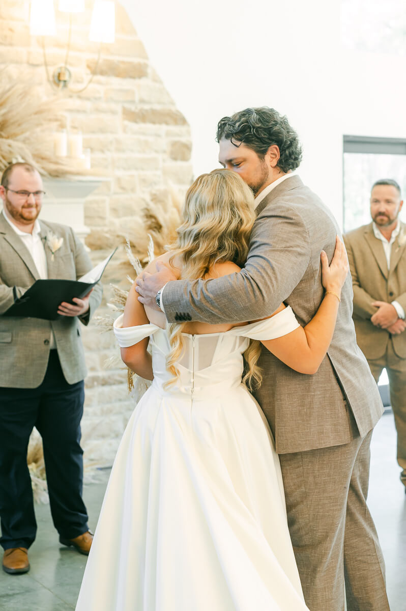 bride and her dad hugging