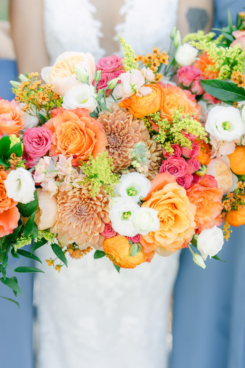 bright orange and pink wedding bouquet