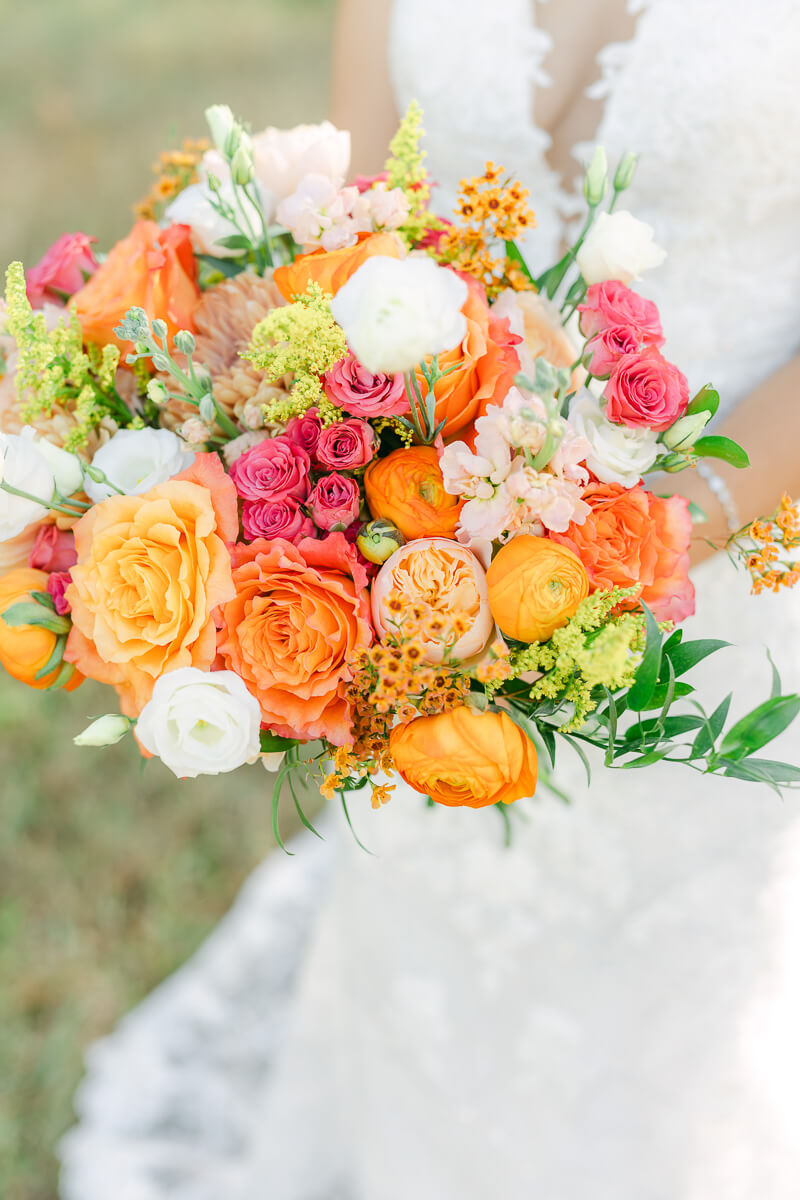 bright orange and pink wedding bouquet