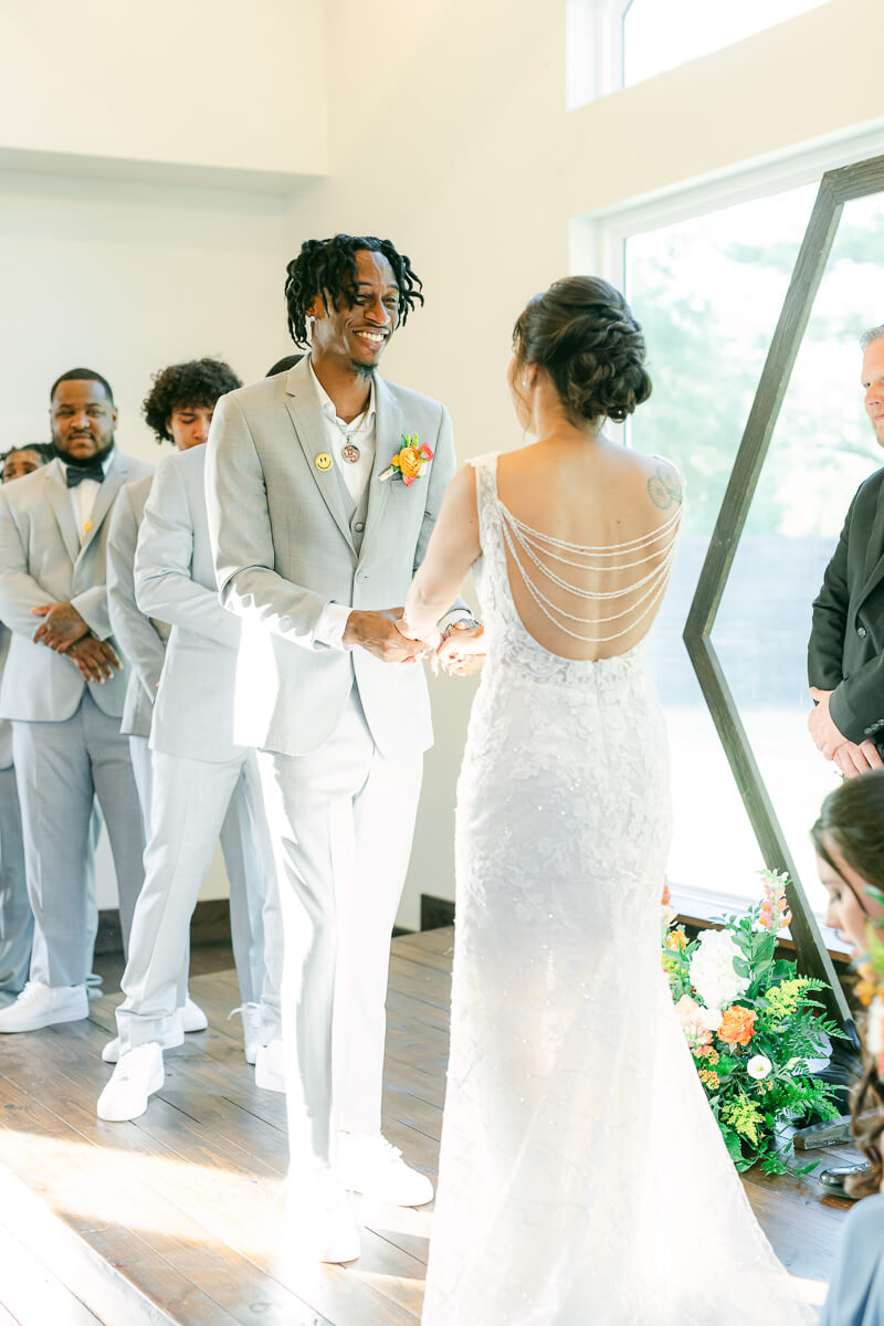 couple at the alter during their ceremony at magnolia meadows 