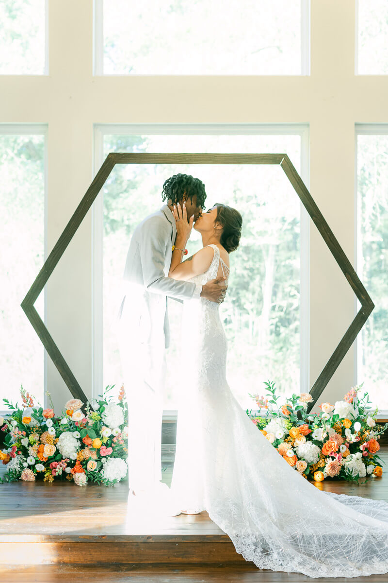 first kiss during ceremony at magnolia meadows 