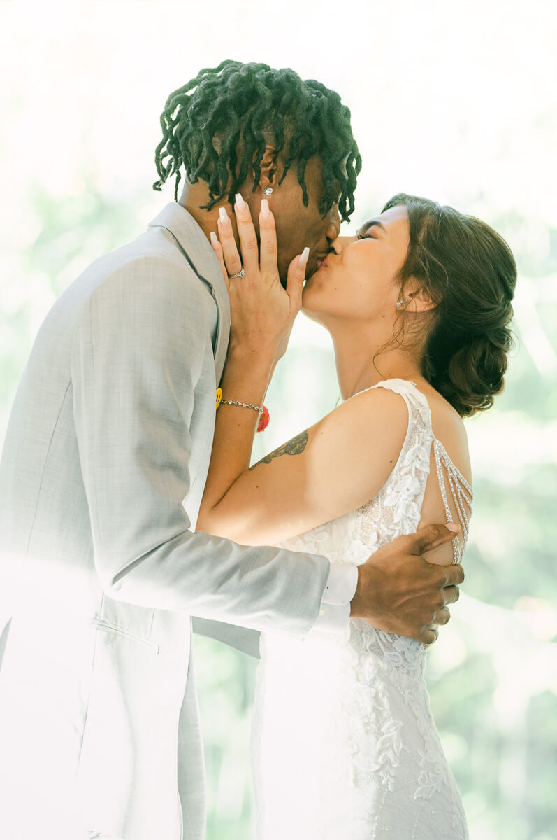 first kiss during ceremony at magnolia meadows 