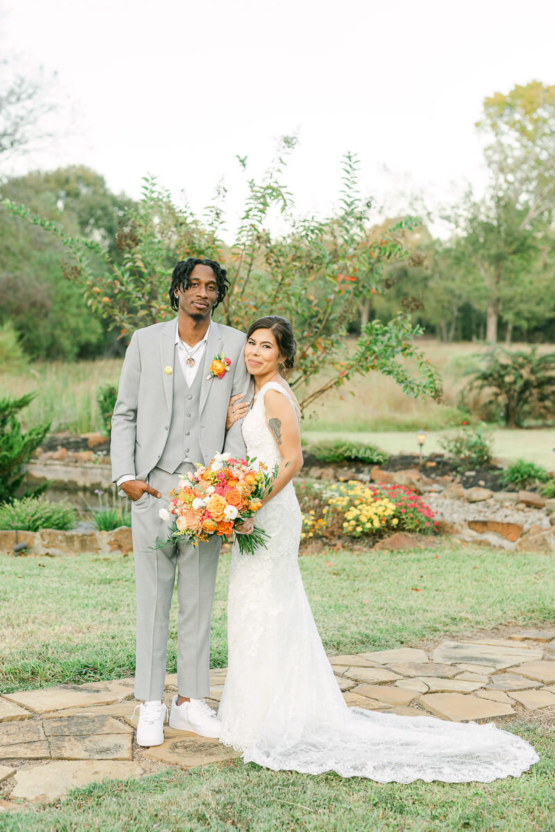 couple posing for photos at magnolia meadows