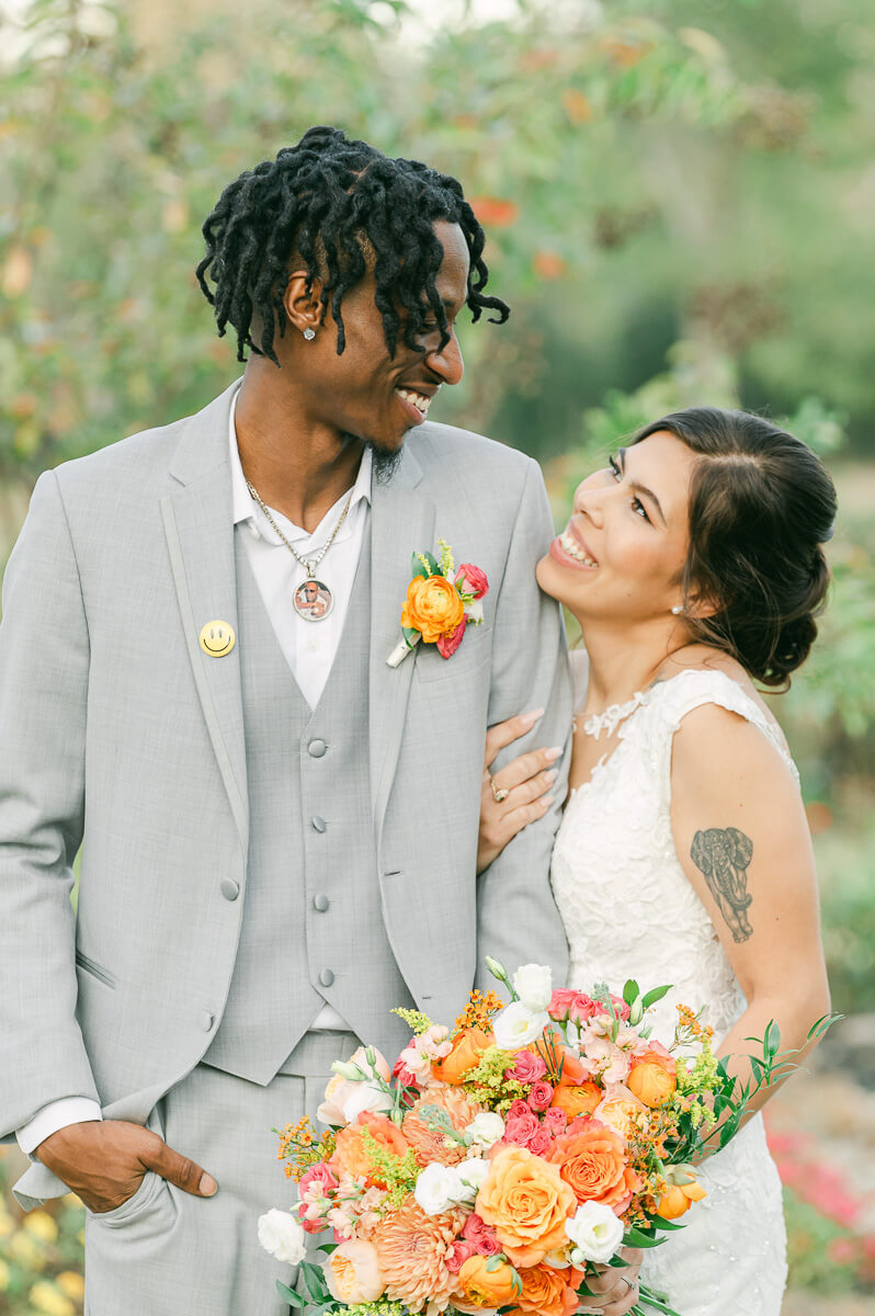 couple posing for photos at magnolia meadows